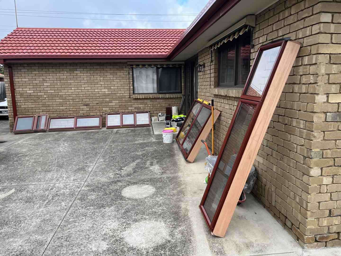 plastic window with timber frame installation